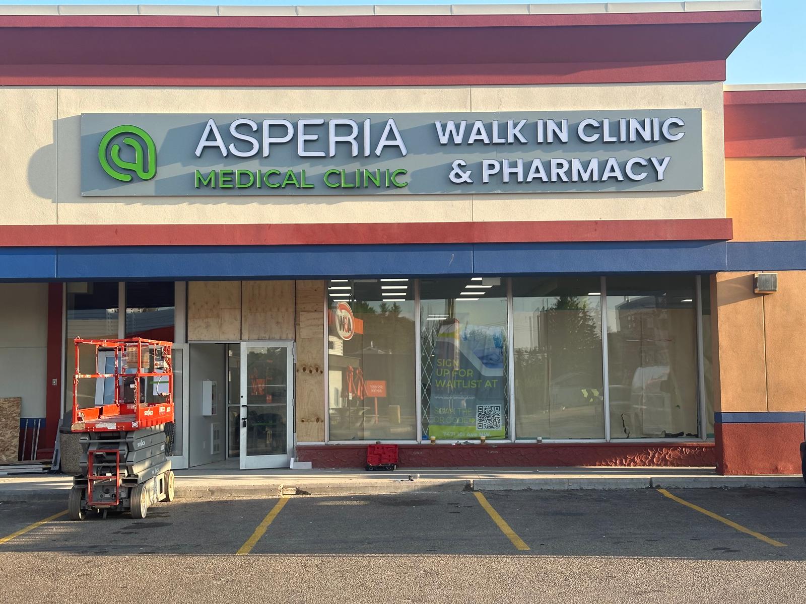Asperia Medical Clinic storefront sign after installation