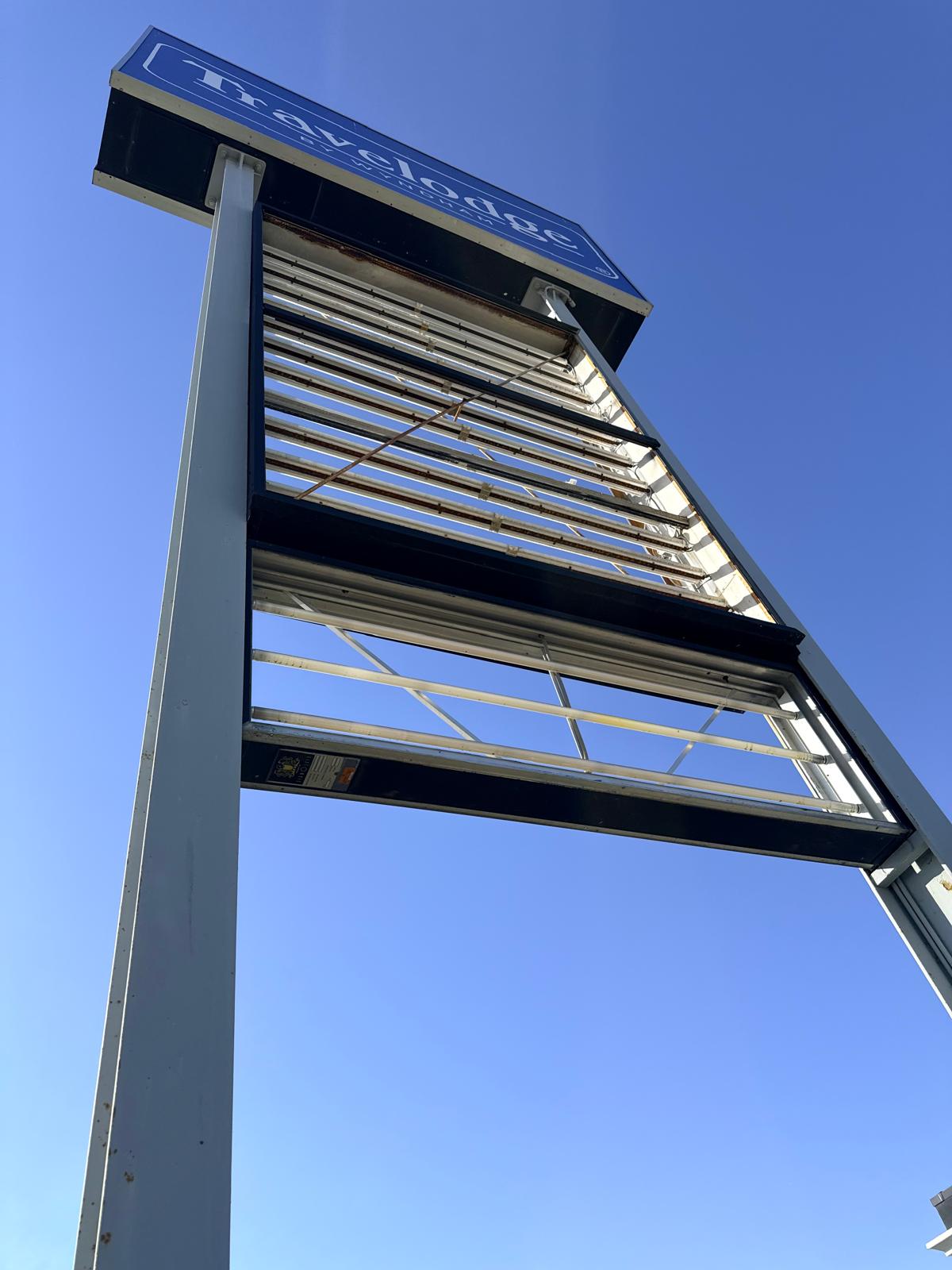 Travelodge pylon sign structure being refaced