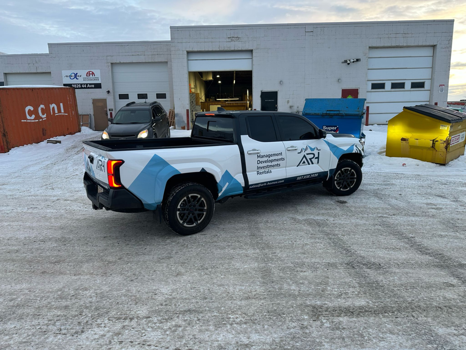 ARH Holdings truck wrap, front three-quarter view