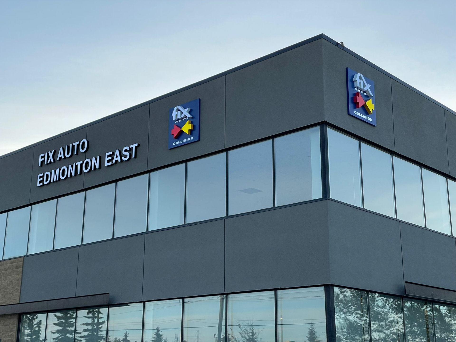 Fix Auto Edmonton East illuminated building letters and logo signs